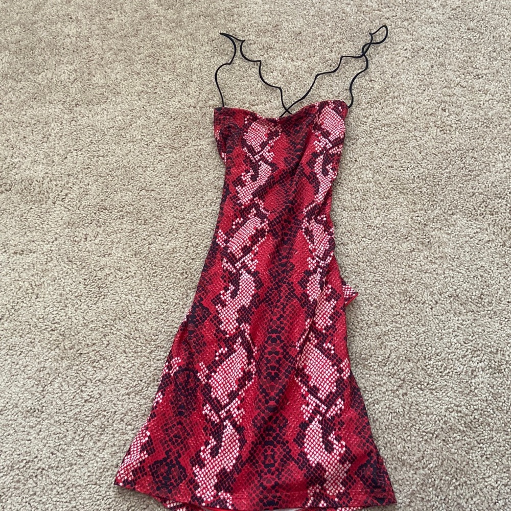Snake print body con dress